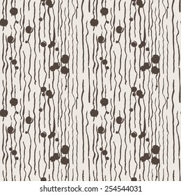 Seamless vector pattern of vertical lines with grungy blots hand-painted with a brush and ink
