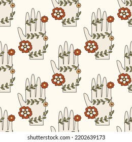 Patrón vectorial sin foco con mano bohemia vintage, flores y lana. Los años 60 y 70 vibra el trasfondo psicodélico. Texto del símbolo de predicción del futuro de dibujos animados. Ilustración del boho de la señal de providencia