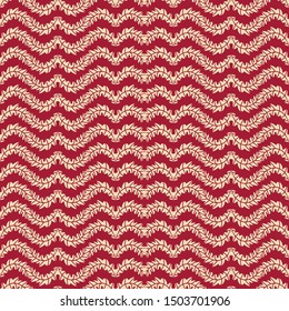A seamless vector pattern with wavy stripes of leaves on a red background. Surface print design.