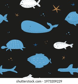 Seamless vector pattern with whales and fishes on a black background. 