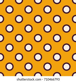 Seamless vector pattern with white circles on yellow background