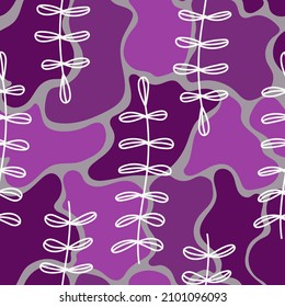 Seamless vector pattern. White leaves on a background of purple spots. Wrapping paper. Cover. Wallpaper. Background.