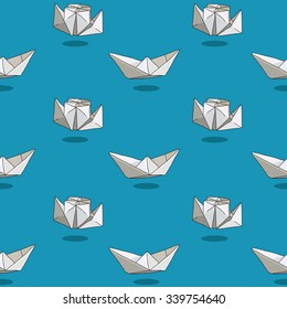 Seamless vector pattern of white paper boats on a blue background, hand-drawn