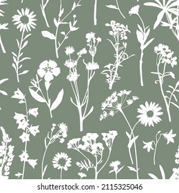 Seamless vector pattern with wildflower silhouettes. Perfect for textile, wallpaper or print design. 