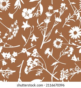 Seamless vector pattern with wildflower silhouettes. Perfect for textile, wallpaper or print design. 