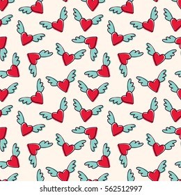 Seamless vector pattern with winged hearts. Hand drawn.