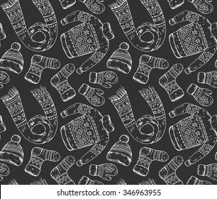 Seamless vector pattern with winter holiday elements. Warm clothes, hat, sleigh, scarf, sweater. Endless Christmas background.