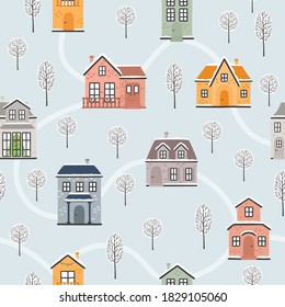 Seamless vector pattern with winter houses and trees.