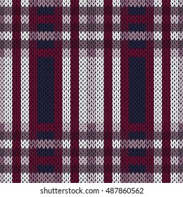Seamless vector pattern as a woollen Celtic tartan plaid or a knitted fabric in contrast hues of dark blue and red, violet and white