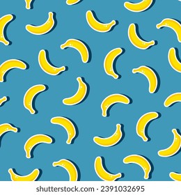 Seamless vector pattern of yellow bananas on a blue background. Yellow fruit.