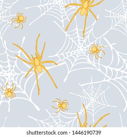 Seamless vector pattern with yellow spiders and spiderweb on light blue background. Animal wallpaper design.