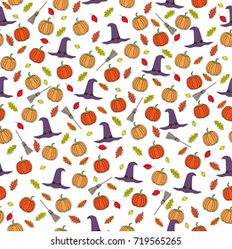 Seamless vector pattern.Pumpkins and leaves and witch hats and brooms halloween autumn pattern on the white background.