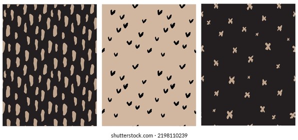 Seamless Vector Patterns with White Abstract Hand Drawn Elements. Brush Crosses, Lines and Arcs on a Gold and Black Bakground. Freehand Irregular Geometric Repeatable Print ideal for Fabric.