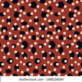 Seamless vector polkadots on the red background. Colorful pattern.