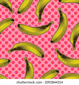 Seamless vector pop art pattern of yellow bananas randomly scattered on light red polka dot background in halftone dot style design.