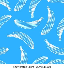 Seamless vector pop art pattern of blue and white bananas randomly distributed on blue background in halftone dot style design.