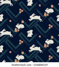 Seamless vector print design with bunnies and flowers