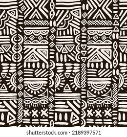 seamless vector repeat mud cloth style pattern on a dark brown background