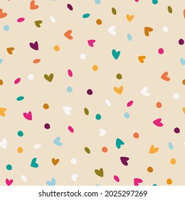 seamless vector repeat pattern with hearts dot and abstract shapes in rainbow colours on a light pink background