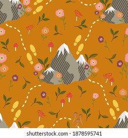 seamless vector repeat pattern with mountains, flowers and footsteps on a mustard yellow background