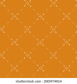 seamless vector repeat pattern with small ditsy florals arranged in a grid in white on a mustard yellow background