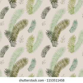 Seamless vector simple pattern with green tropical palm leaves on beige background 