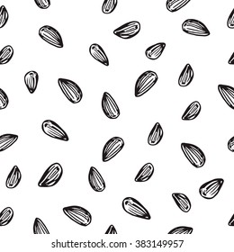 Seamless vector sunflower seeds pattern. Sketch sunflower seeds. Hand drawn texture  Ready design for textile, fabric, surface textures, packaging.