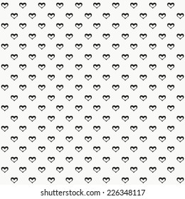 Seamless vector texture with black hearts