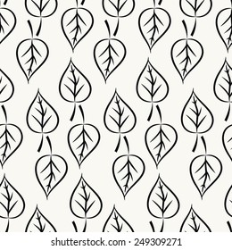 Seamless vector texture with black leafs