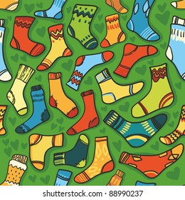 Seamless vector texture - bright baby socks with a green background. Seamless pattern with funny winter socks 