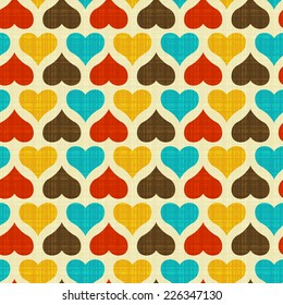 Seamless vector texture with colorful hearts