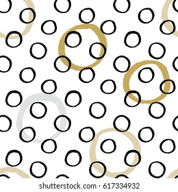Seamless vector texture pattern with hand drawn circles and dots.