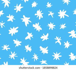 Seamless vector texture with white hand-drawn grunge snowflake-stars isolated on light blue background. Winter simple pattern of abstract spots