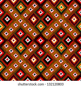 Seamless vector tribal background. Multicolored background. Vector illustration. Seamless tribal texture look like carpet. Ethnic pattern.