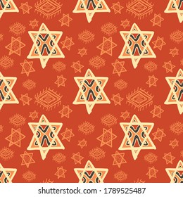 Seamless vector of tribal style motif star shape on pastel orange background