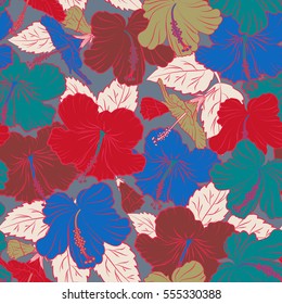 Seamless vector tropical design with hibiscus in blue and red colors. Pattern for summer fashion, interior, wallpaper. Vector illustration. Exotic flowers in allover composition.