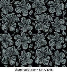 Seamless vector tropical design with hibiscus on a black background in neutral colors. Exotic flowers in allover composition. Pattern for summer fashion, interior, wallpaper.