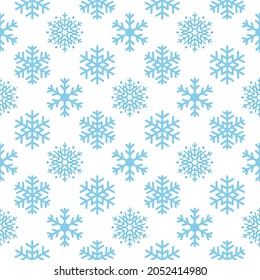 Seamless vector winter background of snowflakes arranged in regular rows. Winter fairy tale, Christmas symbol.