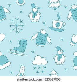 Seamless vector winter pattern on a light blue background painted by hand.