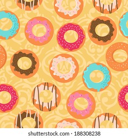 Seamless vector yellow background with different donuts