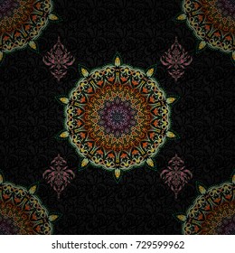 Seamless vector yellow, blue and green ornament in arabian style on a black background. Pattern for wallpapers, backgrounds, flyers or wrapping paper. Seamless pattern with damask ornament.