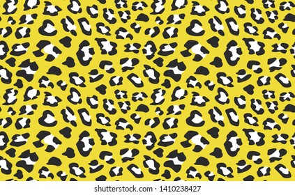 Seamless vector yellow colored leopard pattern.  Trendy stylish wild leopard print. Animal print background for fabric, textile, design, advertising banner.