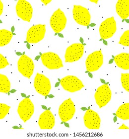 Seamless vector yellow lemons on white background with polka dots on. 10 eps citrus pattern with chaotic elements. For design, fabric, textile, cover, web.