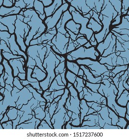 Seamless velvet pattern of black branches on a blue background. Textile ornament from endless silhouettes for fabric, wallpaper tile on the wall, paper.