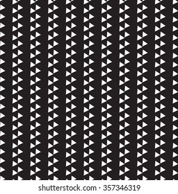Seamless vintage abstract pattern with triangles in the style of 80's. Fashion background in Memphis style Texture for scrapbooking, wrapping paper, textile, web page, textile, surface design, fashion