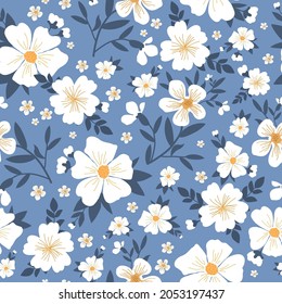 Seamless vintage abstract pattern. wonderful white flowers and dark blue leaves on a blue background. vector texture. trend print for textiles and wallpaper.