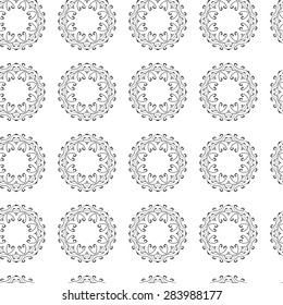 Seamless vintage decorative pattern with a black circular geometric pattern on a white background. Medallion, mandala, yoga, india, arabic Hand drawing.