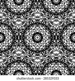 Seamless vintage decorative pattern with a black circular geometric pattern on a white background. 