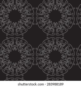 Seamless vintage decorative pattern with white circular geometric pattern on a black background. Medallion, mandala, yoga, india, arabic. Hand drawing.