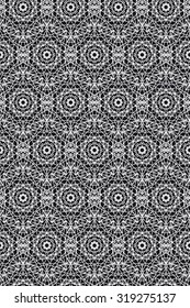 Seamless vintage decorative pattern with a white circular geometric pattern on a black background, in vector.